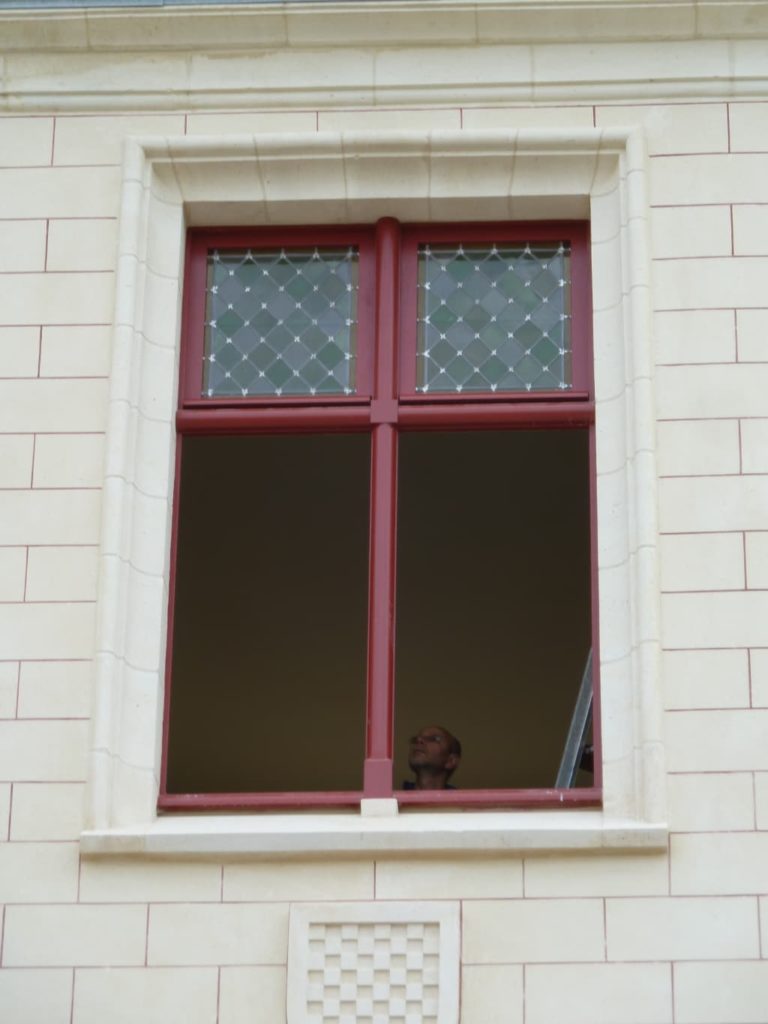 Fenêtres en bois, travail de restauration